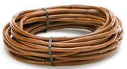 A coil of brown landscape dripline tubing.