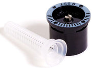 Rain Bird 9SST Side Strip Pattern sprinkler spray nozzle with black body and white filter screen, marked with '15 PSI' on the top.