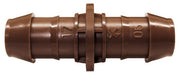 A brown barb x barb coupling fitting for irrigation systems. 2-Way Joint, Dripline