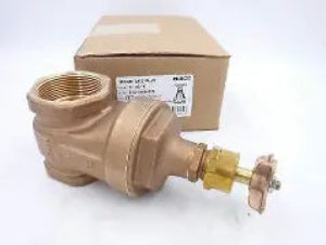Brass valve with packaging on a white background