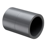 A gray PVC coupling fitting with a socket end connection, injection molded, for use in plumbing.