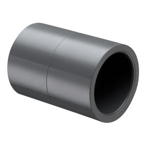 A gray PVC coupling fitting with a socket end connection, injection molded, for use in plumbing.