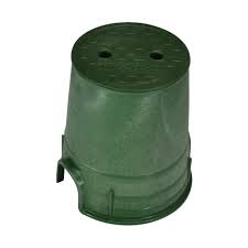 A green circular valve box with a green cover, likely made of plastic, with two holes on the top side for installation.