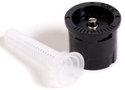 A black sprinkler spray nozzle with a white filter screen attached, designed for a pop-up irrigation system.