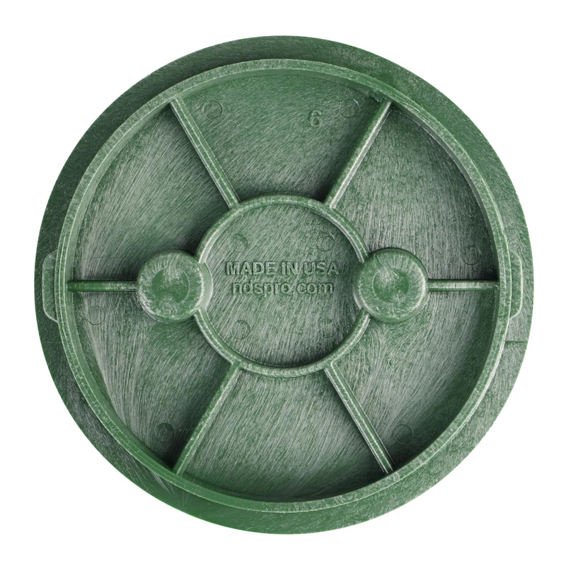 Green plastic component with 'Made in USA' text on a white background