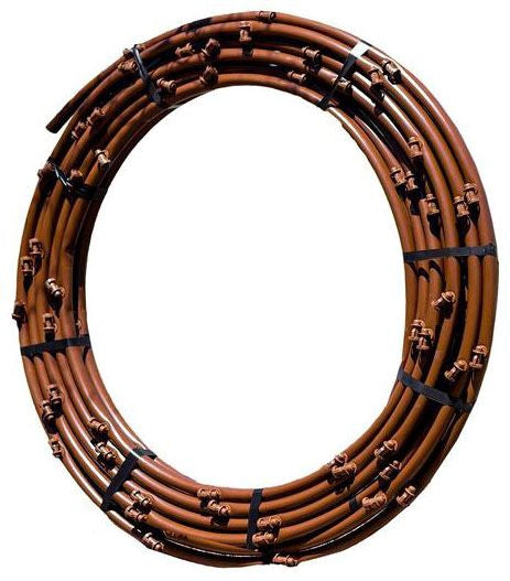 A coil of brown PVC dripline irrigation tubing with emitters attached, designed for use in lawn and garden watering systems.