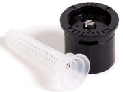 A black sprinkler spray nozzle with a white filter screen attached to it.
