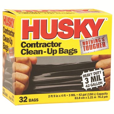A box of Husky brand contractor clean-up bags, with the product visible through a clear window on the packaging. The box is yellow with black and red text, indicating the product is a heavy-duty 42 gallon bag, 32 bags per box.