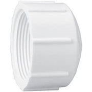White plastic pipe fitting on a white background