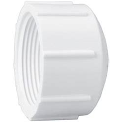 White plastic pipe fitting on a white background