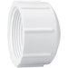 White plastic pipe fitting on a white background