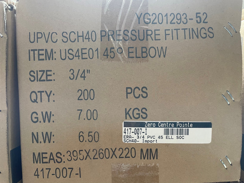 A cardboard shipping box for UPVC SCH40 pressure fittings, specifically a 45-degree elbow, size 3/4 inch. The box contains 200 pieces and has printed specifications, weight, and a white barcode label from Zero Centre Pointe.