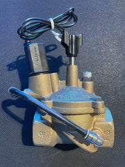 Bronze valve with wiring on a blue background