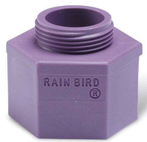 A purple plastic Rain Bird shrub adapter with threaded connections for irrigation systems.