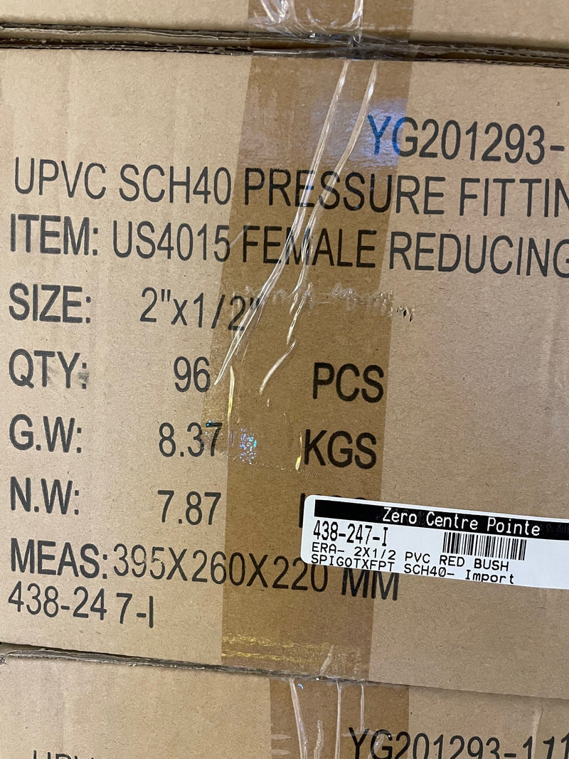A close-up of a brown cardboard shipping box printed with product details for a UPVC SCH40 pressure fitting, including item number US4015 Female Reducing.