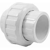 A white PVC union fitting, with a socket connection on each side, isolated on a white background.