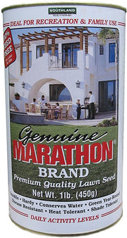 A can of Marathon brand premium quality lawn grass seed, showing a graphic of a two-story house with a lawn in the background.