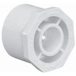 A white PVC red bush spigotxsoc SCH40 fitting, commonly used for irrigation.