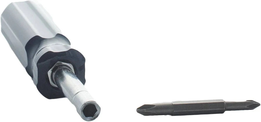 Metal drill bit and chuck on a white background