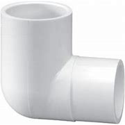 A white PVC 90 degree ell spigot fitting.