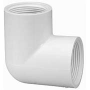 White PVC 90 degree elbow fitting with female thread on both ends.