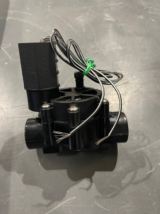 Black electric irrigation valve with 1 inch NPT female threading, made of plastic, designed for landscape and watering applications.