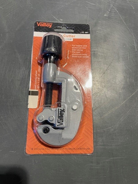 Valley brand cable cutter on an orange packaging against a metallic background