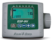 Rain Bird ESP-9V Battery Operated Sprinkler Controller in gray color with a digital LCD screen, wall mount design, and buttons for operation.