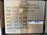 A brown cardboard shipping box printed with product information for UPVC SCH40 pressure fittings, specifically a straight tee, item number US4T01. The box shows size, quantity, gross weight, net weight, and measurements, with a barcode label for Geo Centre Pointe.
