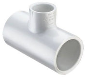 A white PVC reducing tee fitting with socket end connection.