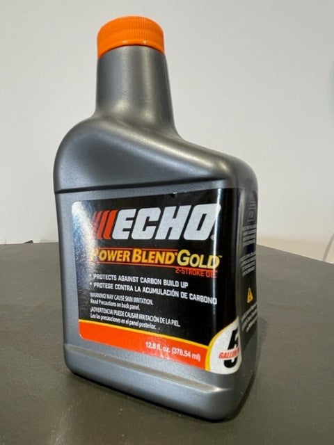 A bottle of Echo branded 'PWRBLD GOLD' engine oil, with a volume of 12.8 fluid ounces, designed for 2-stroke/2-cycle outdoor power equipment engines.