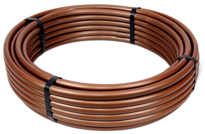 A coil of brown Rain Bird XERI-Flex Blank Tubing designed for irrigation systems.