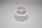 A white PVC reducing male adapter with a threaded male end and a socket end.