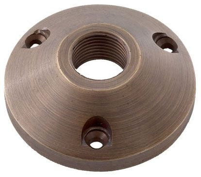 A solid brass surface mount light fixture component in bronze color with a textured surface and multiple mounting holes.