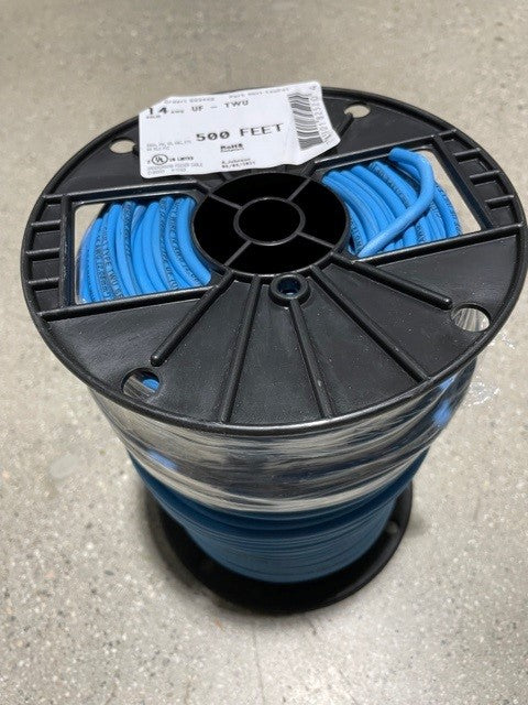 A spool of blue-colored underground irrigation wire inside a black plastic spool with a label indicating the product details.
