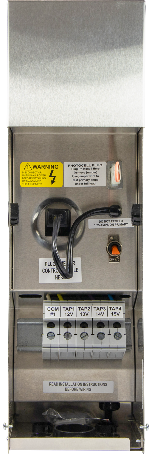 A silver-colored Brilliance LED transformer for landscape lighting with multiple taps, including a secondary circuit breaker and conduit knockouts.