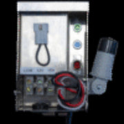 Outdoor payphone with a key attached, surrounded by various electronic devices.