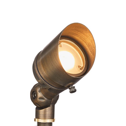 An LED spotlight with a bronze-colored housing and a round, illuminated head.