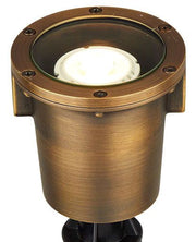 Low profile, cast brass, waterproof LED landscape pathway light with a clear flat glass lens, designed for ground installation.