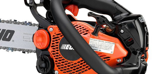 Close-up of a Husqvarna chainsaw on a white background