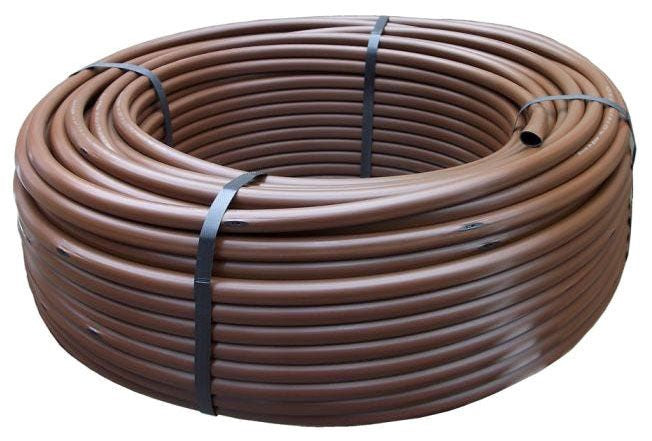 A coil of brown Rain Bird XFD 09 12 500 Dripline tubing for irrigation.