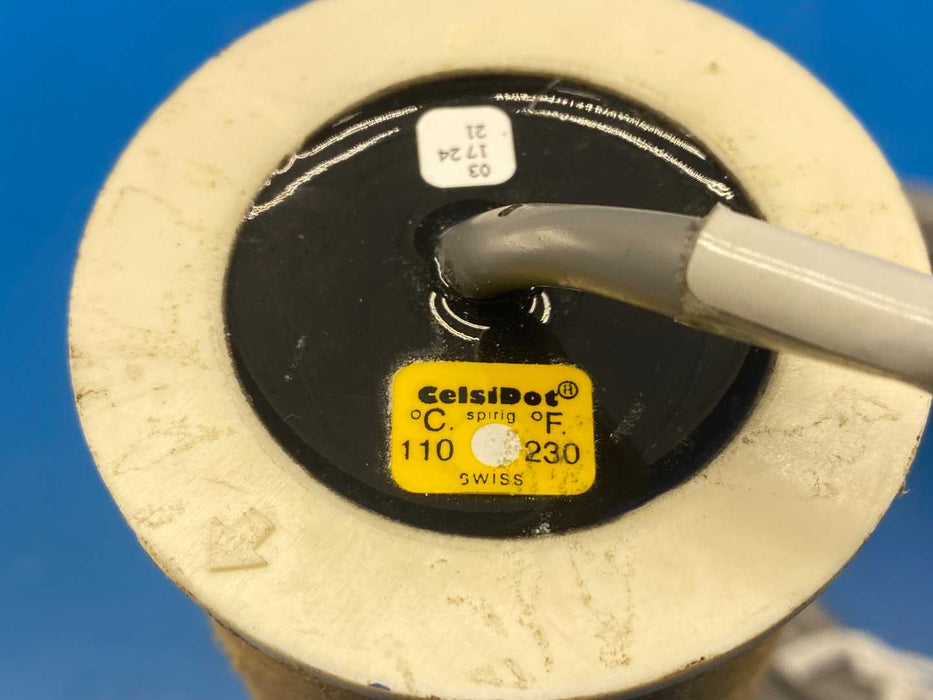 Thermometer with Celsius and Fahrenheit labels on a blue background