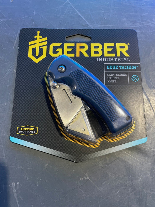 Gerber Industrial knife on a blue textured background
