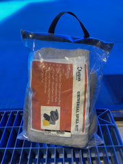 outpak universal spill kit in a clear bag on a blue background