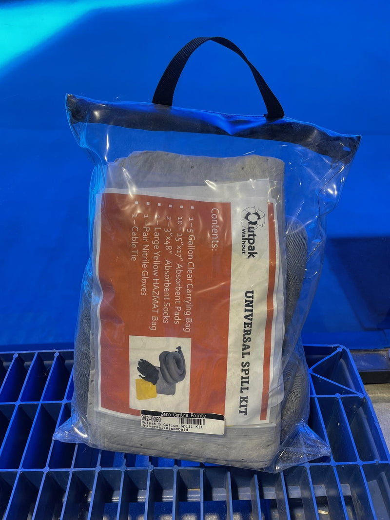 outpak universal spill kit in a clear bag on a blue background